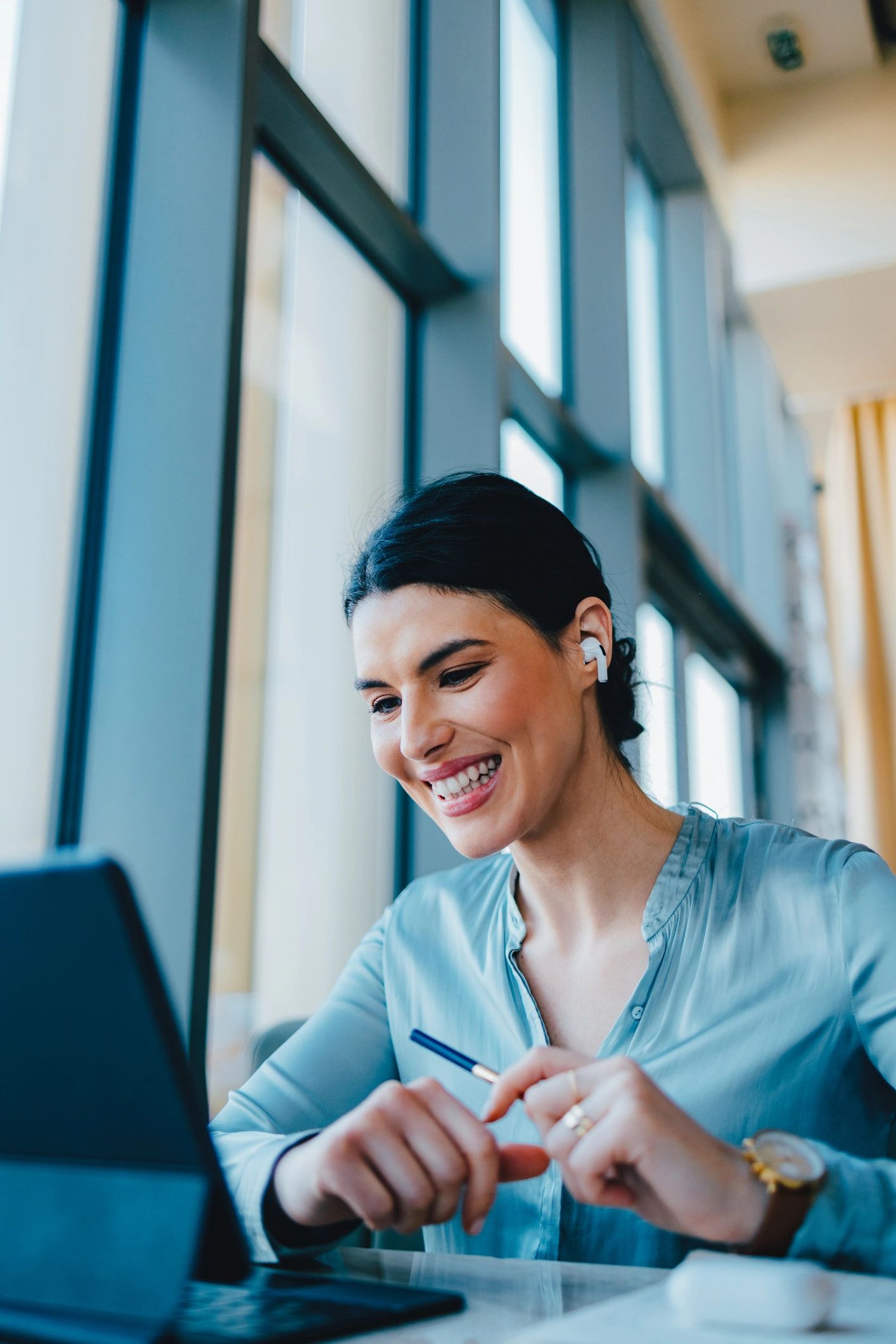 Woman participating in a telehealth mental health session from her desk